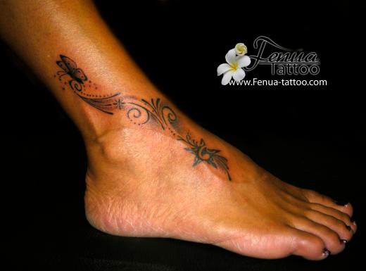 4b°) tatouage de papillon sur le pied